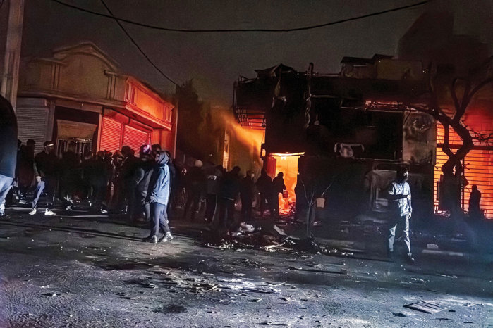 Colapsul discret al unei bănci ce a prevestit haosul care a cuprins Iranul