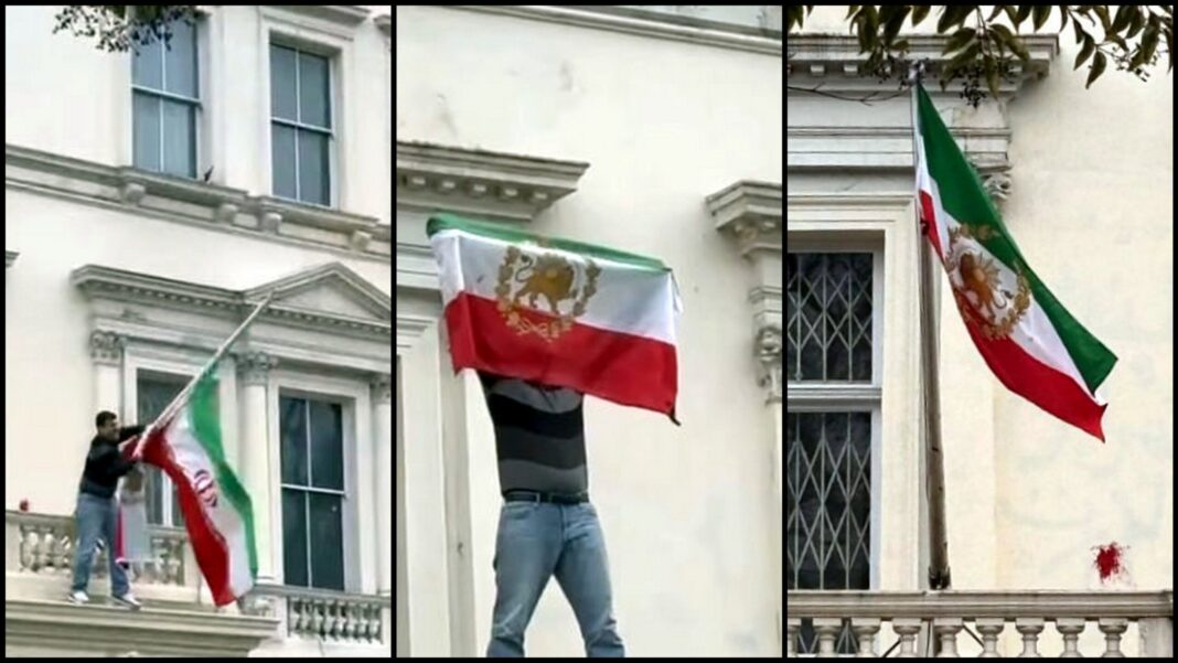Drapelul Republicii islamice Iran, înlocuit câteva minute de un manifestant cu un drapel al fostei monarhii, la ambasada de la Londra